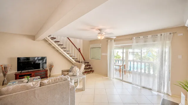 Living room over two levels with stairs