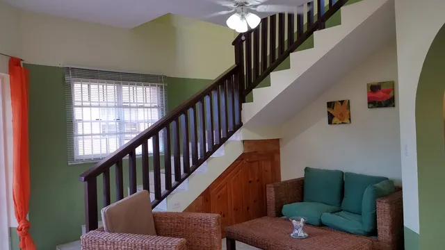 Two-story two-bedroom unit with interior staircase at White Sands