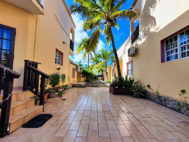 Tiled central walkway between the two White Sands buildings